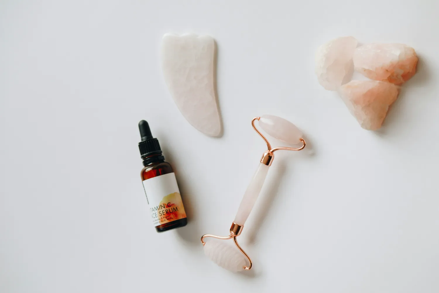 Eye care essentials with rose quartz roller and serum